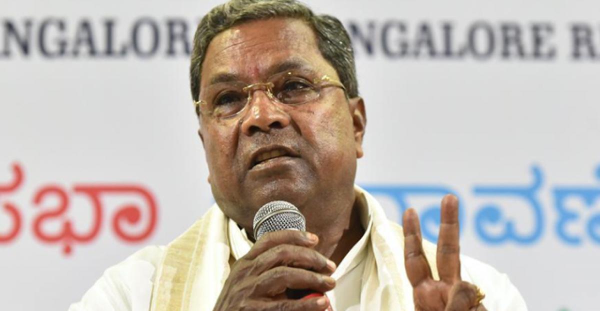 Siddaramaiah slaps legal notice on Narendra Modi