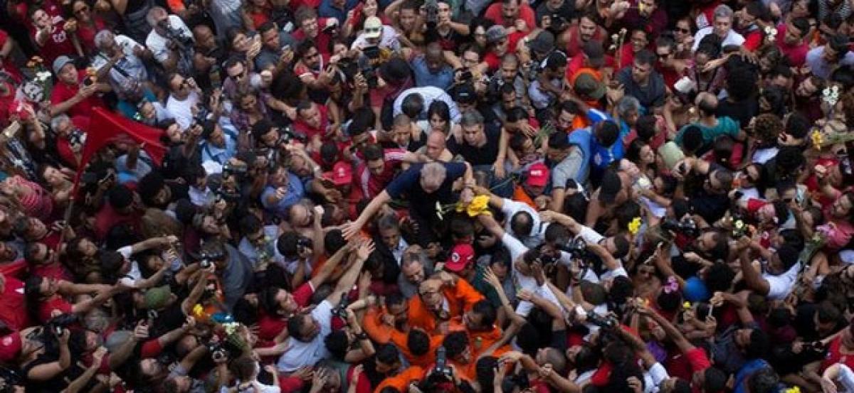 Fireworks, tears after ex-Brazilian president Lulas surrender