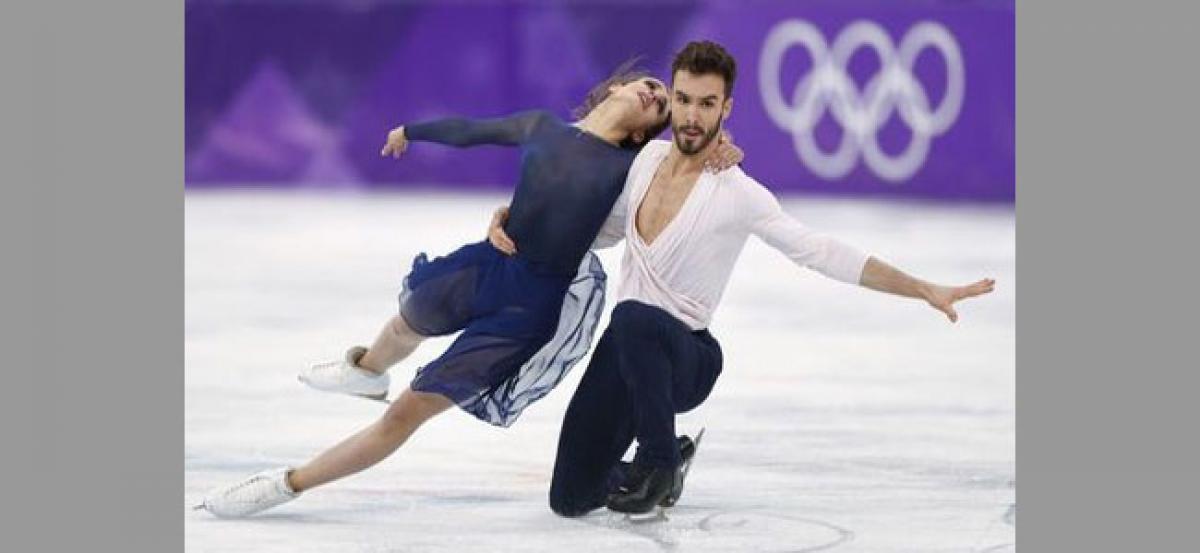 Olympic skaters take extra precaution to stay covered during the show