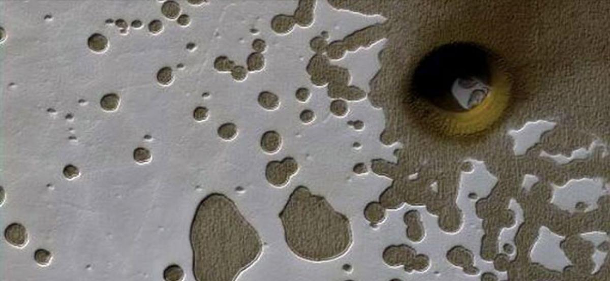 Scientists spot massive ice deposits on Mars