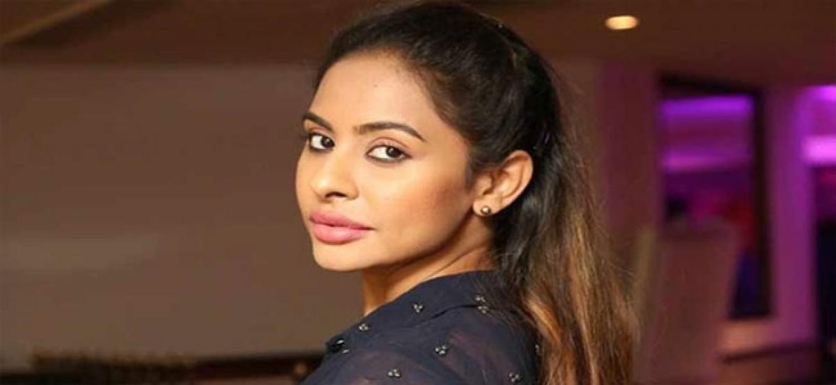 Sri Reddy hits self with slippers