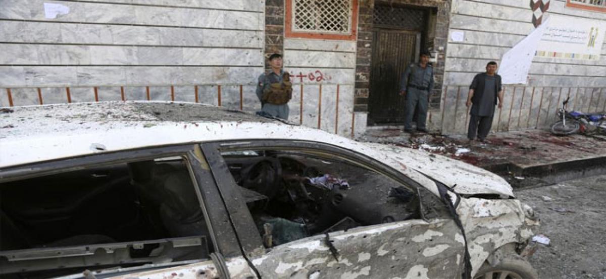 Suicide bombing at election centre in Kabul kills 31, Islamic State claims attack