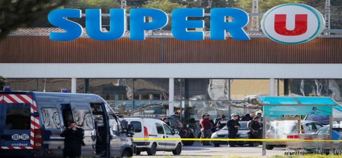 IS claims responsibility for France supermarket shooting