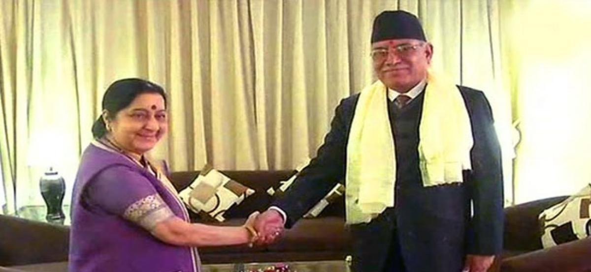 Sushma Swaraj calls on Pushpa Kamal Dahal