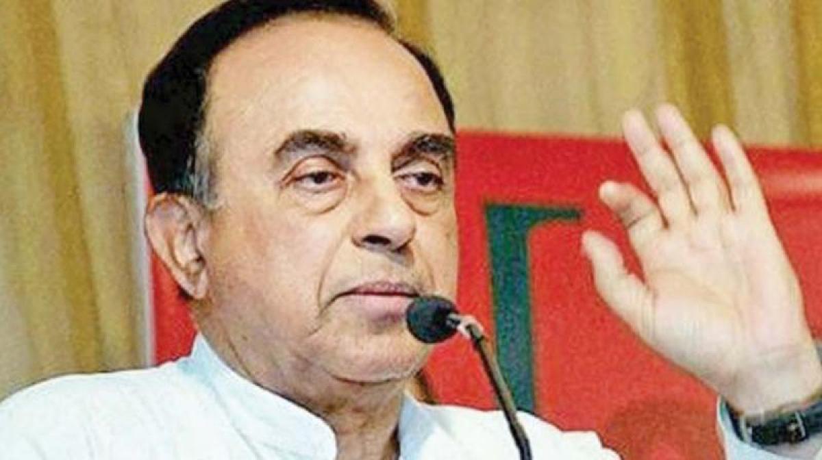 Declare you are Hindu, not Christian: Swamy mocks Rahuls visit to Gujarat temple