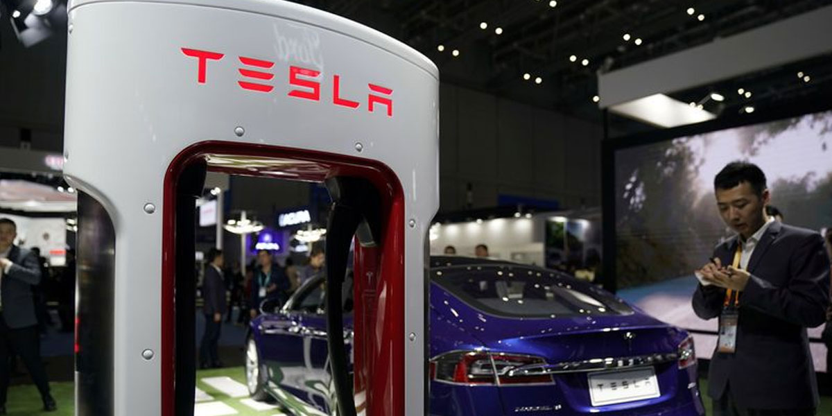 Tesla names close Musk friend Larry Ellison to board
