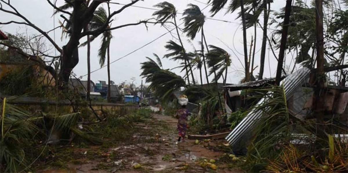 Repair works in progress at cyclone Titli effected site in Visakhapatnam