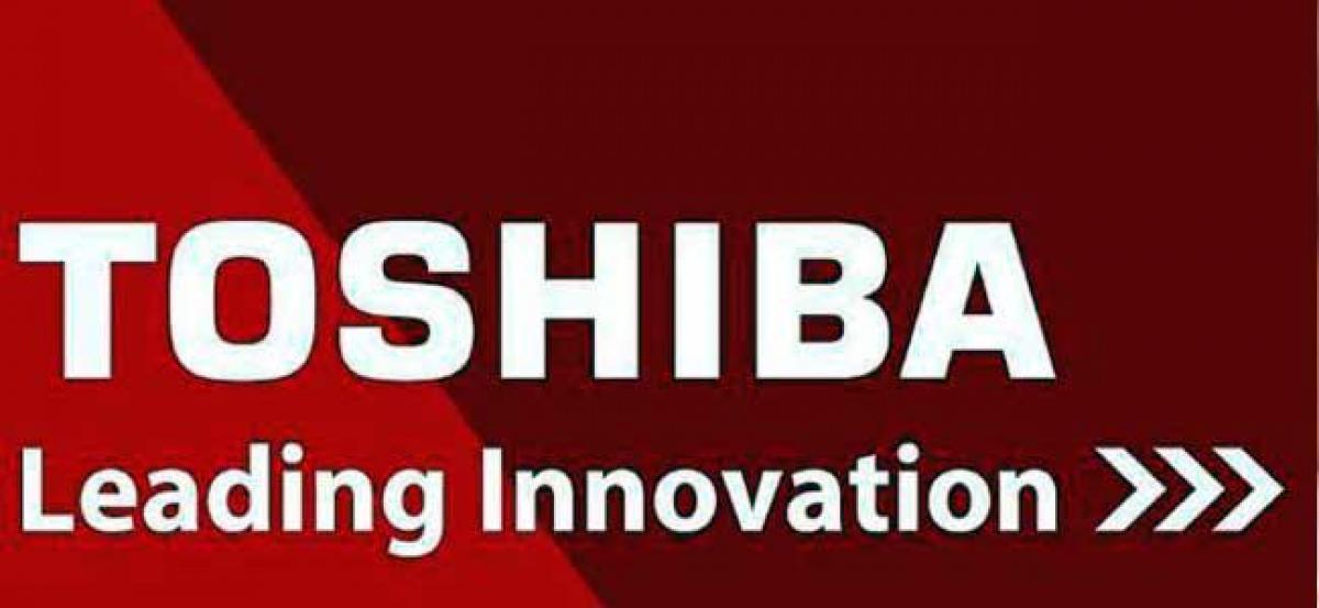 Toshiba to shed troubled assets, cut jobs; shares jump nearly 12 per cent