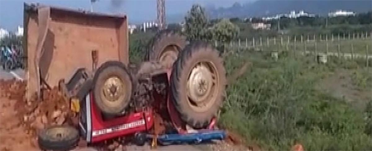 13 workers hurt as RTC bus hits tractor