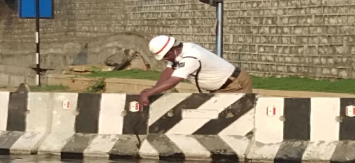 Home guard clears debris to restore free flow of traffic