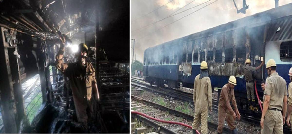 Two train coaches set ablaze, buses torched in Delhi: Police