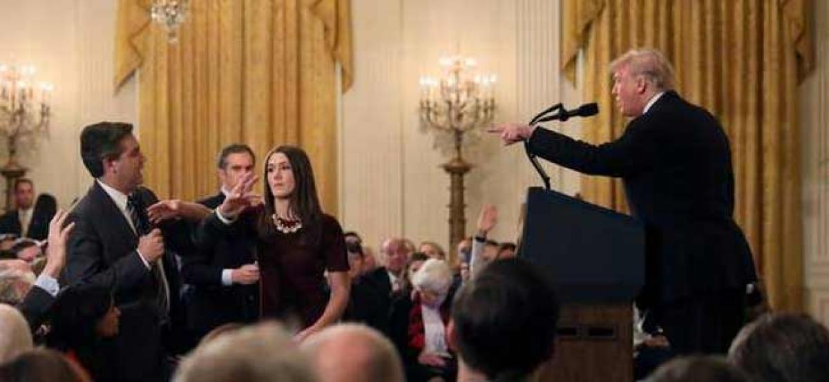 CNN reporter loses White House access after confrontation with Donald Trump