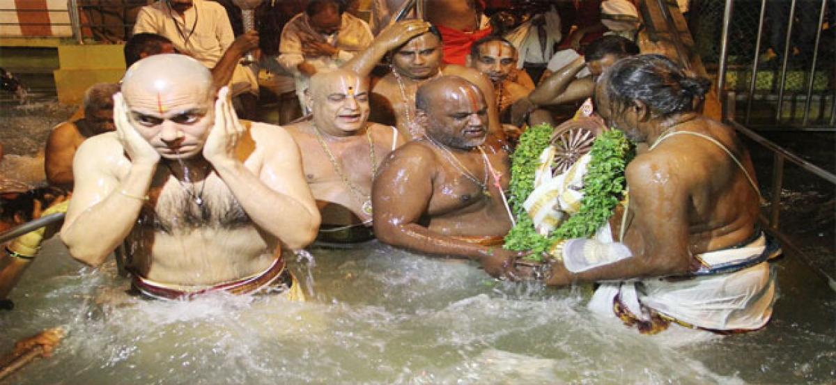 Dwadasi Chakrasnanam performed