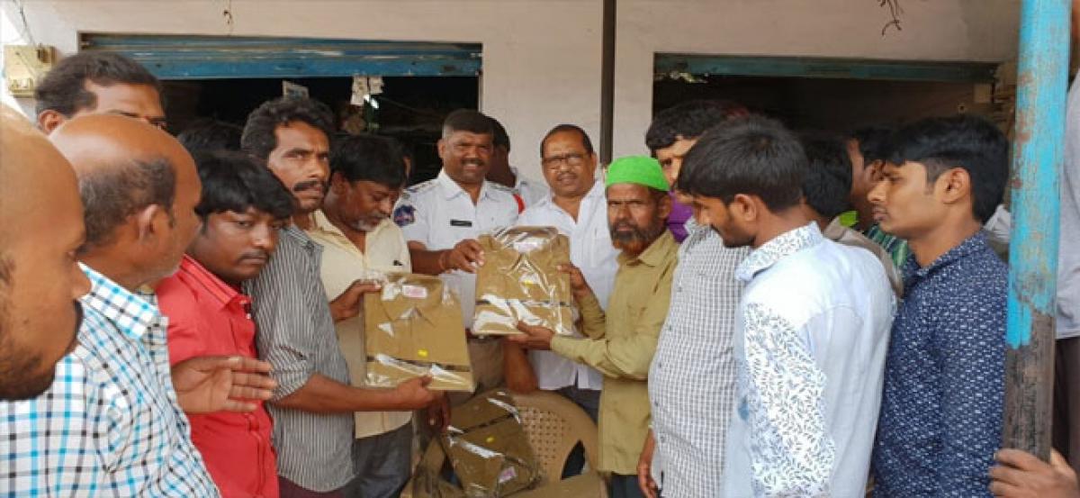 Uniforms distributed to auto drivers
