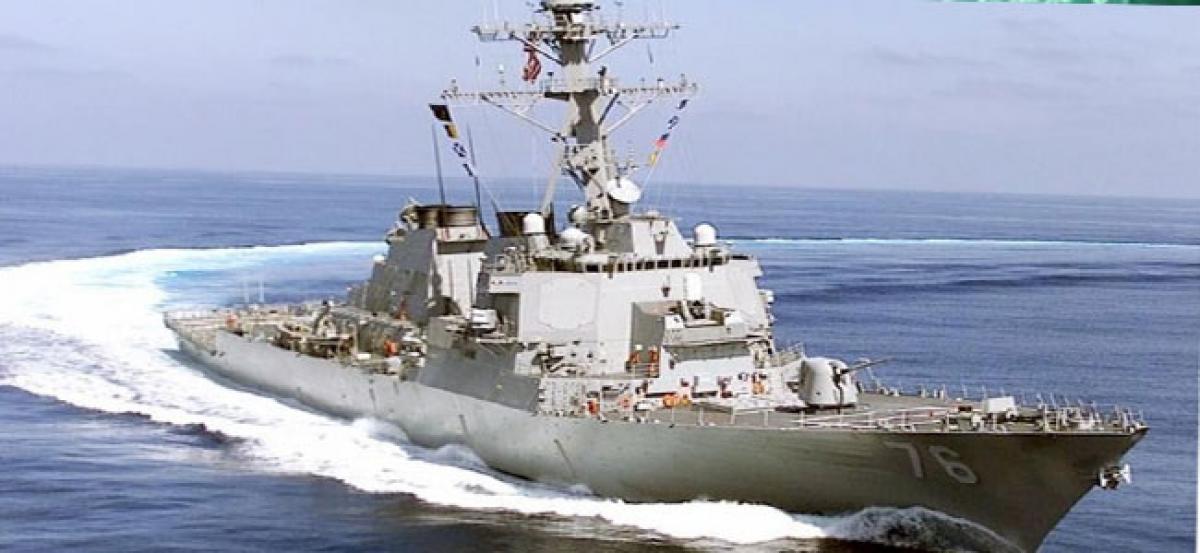 US warships sail near South China Sea islands claimed by Beijing