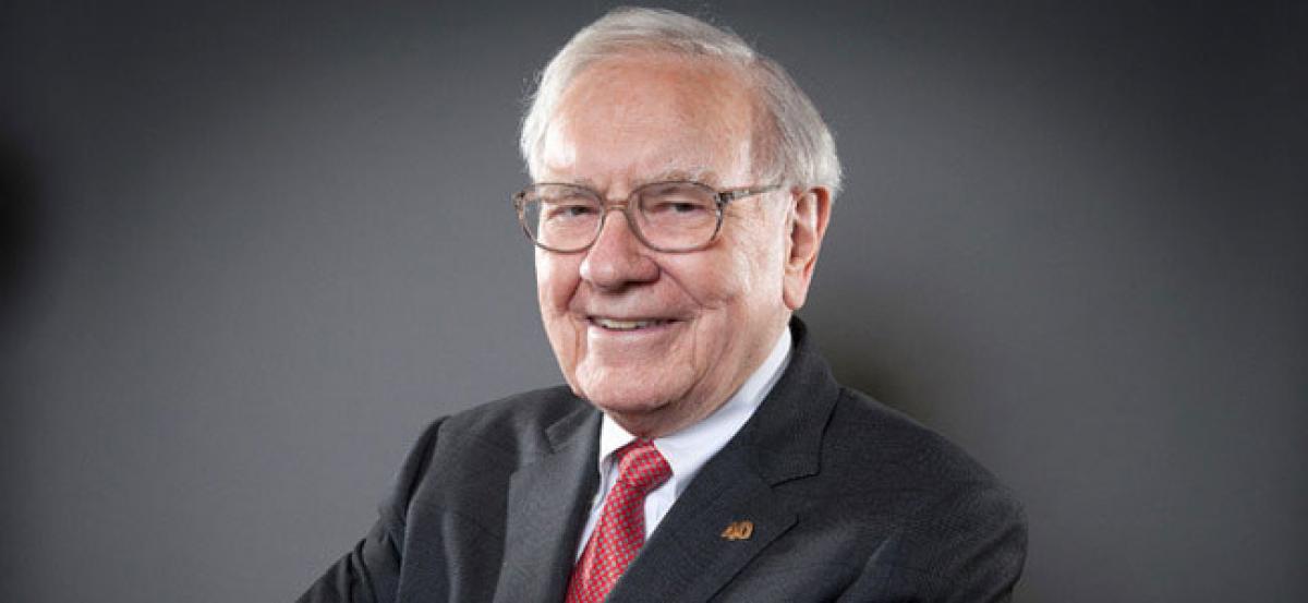 Warren Buffet doesnt use an iPhone but wants to own 100% of Apple
