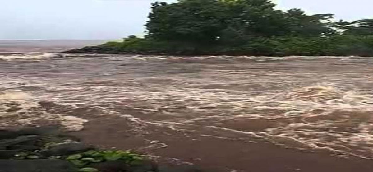 Woman, two children washed away