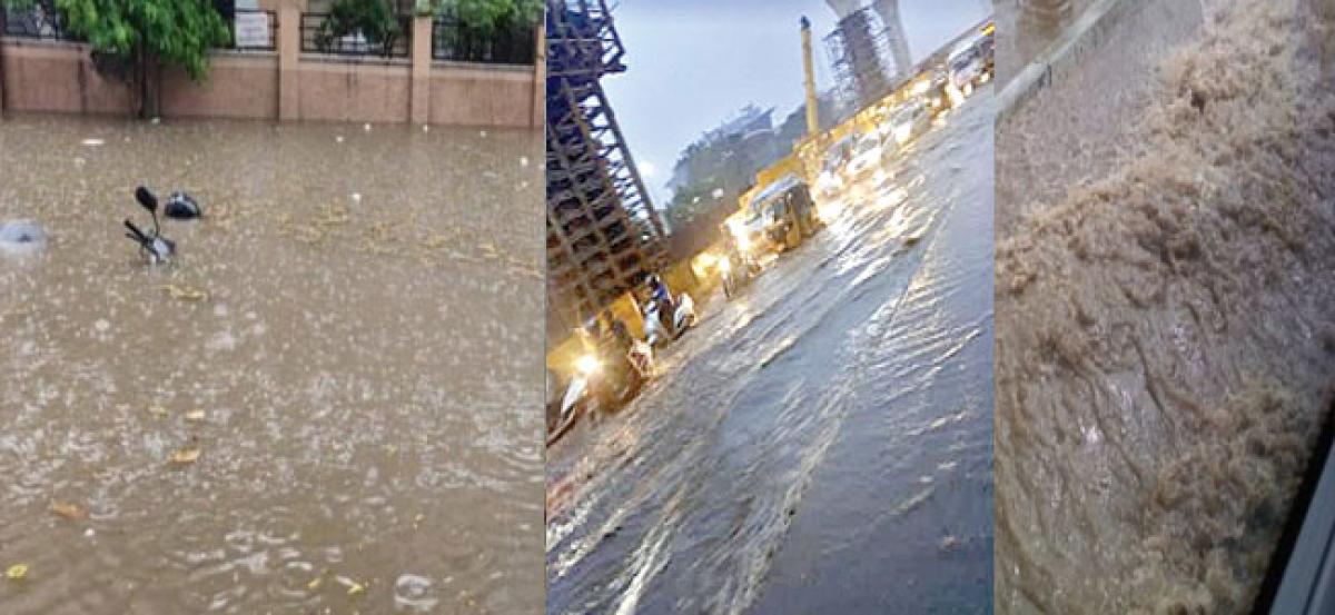 Heavy downpour off woes in Madhapur