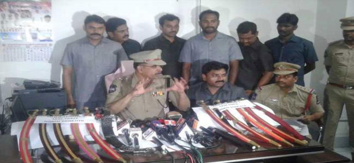 12 men buy swords, knives online, post pictures on social media; detained