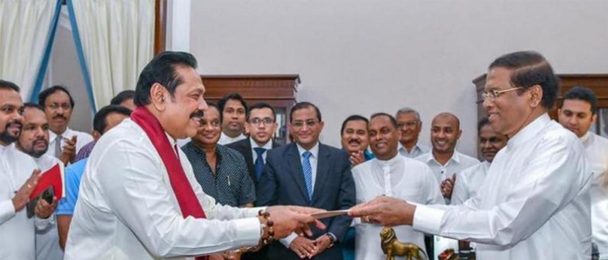 Ex-Lankan president Rajapaksa becomes new PM amid political drama