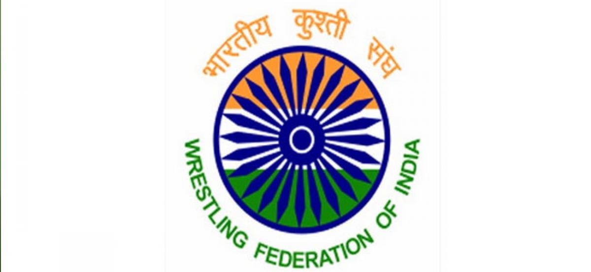 WFI provisionally suspends coach Kripa Shanker Patel over `objectionable` social media post