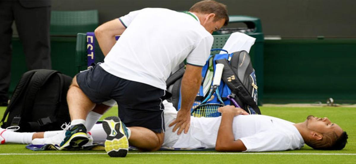 Wimbledon officials defend playing conditions