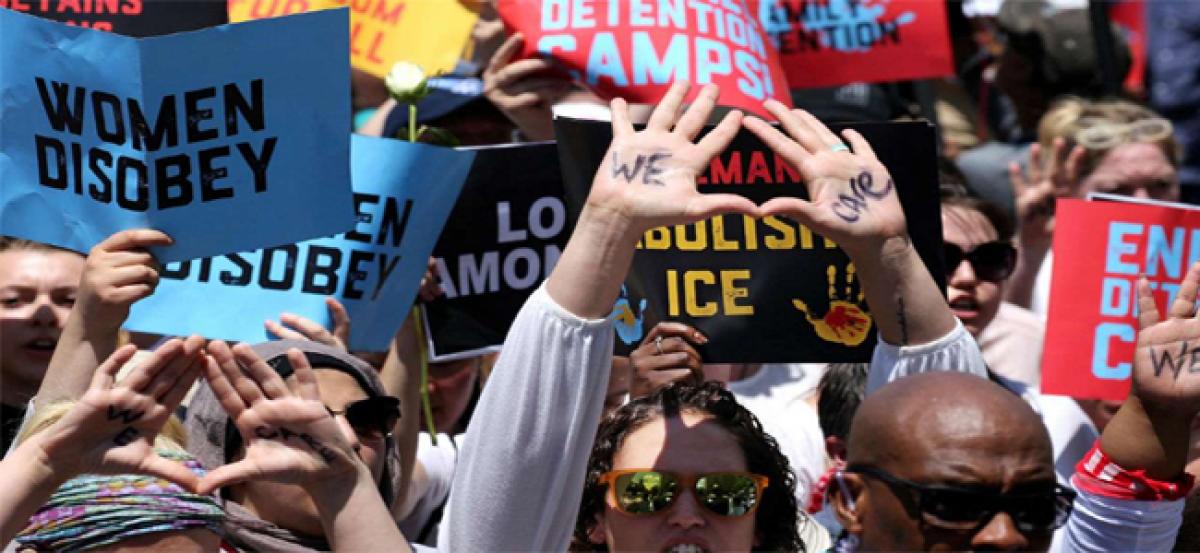 Women march through Washington against Donald Trumps immigration policy