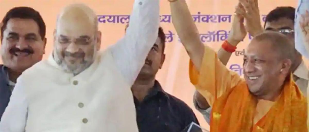 Amit Shah and Yogi Adityanath take a hit at Congress, after Modi.